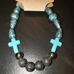Turquoise cross lava rock bracelet